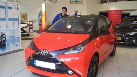 Happy Customer Takes Delivery of New AYGO X-Cite