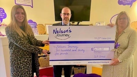 SLM Toyota Norwich visits Nelson’s Journey for first time since COVID hit to deliver donation cheque