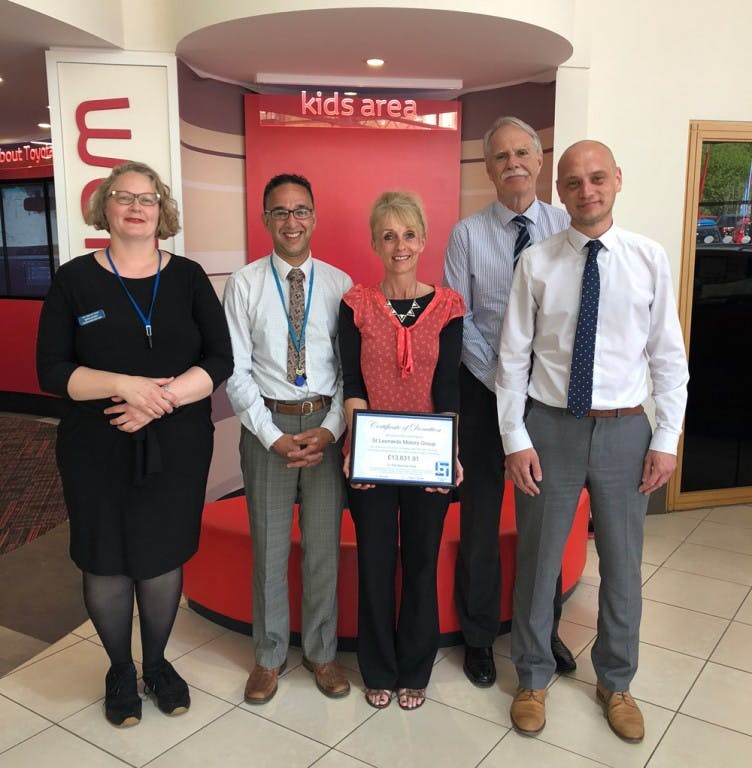 SLM Receives Certificate of Donation From Sara Lee Trust